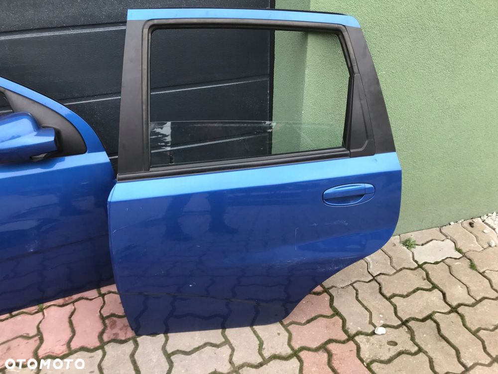Daewoo Kalos Chevrolet Aveo 33u DRZWI TYLNE KLAPA LAMPA TYL - 3