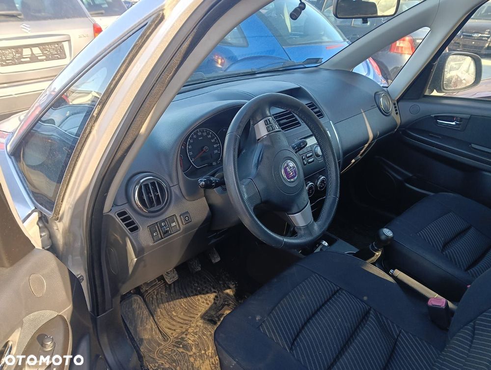 Zderzak Przód (Lampa, Błotnik, Maska, Drzwi, Klapa, Kierownica) Fiat Sedici 1.6 Benzyna 107 Km 2009r - 4