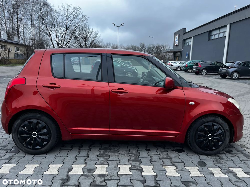 Suzuki Swift 1.5 GLX / Comfort - 13