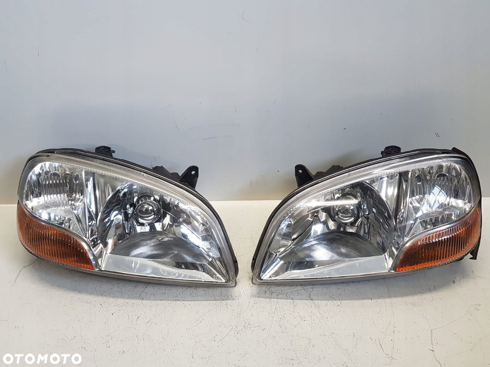 SUZUKI IGNIS 00- LAMPA LEWA PRZÓD PRZEDNIA EUR - 1