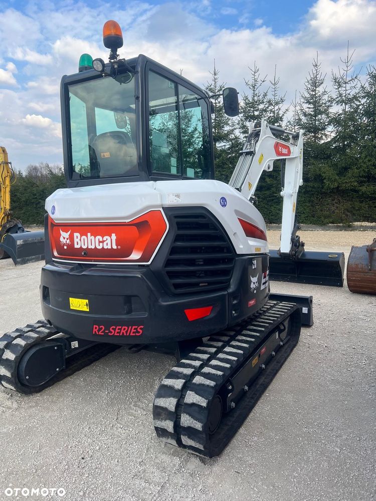 Bobcat Minikoparka Bobcat e50Z 5ton e55 e60 Cat 303.5 304  305 3xłyżki Ramię LOONG dodatkowe linie hydr wyjścia AUX1 + 2 przeciw waga MAX-dociążenie gąsienice 85% od nowości 1 właściciel z Niemiec Auto IDLEE po serwisie Widły wiertnica grabie i inne za dopłatą Szybkozłącze hydr Miller łyżka przedsiębierna Pług  Kubota Takeuchi Jcb - 39