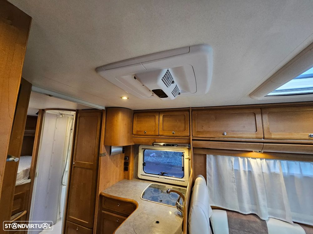 Rapido Le Randonneur 9097F CHASSI AL-KO Cama transversal + BASCULANTE - 37