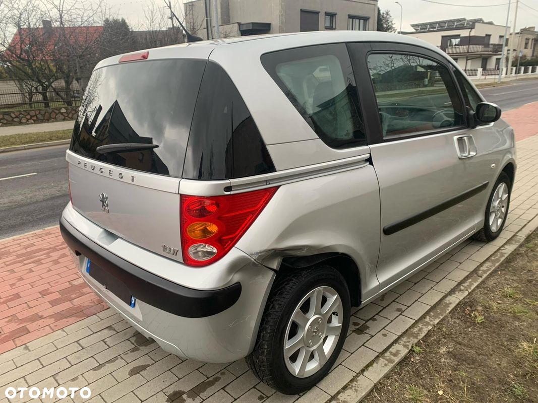 Peugeot 1007 1.4 Trendy - 8