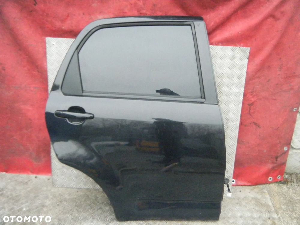 DAIHATSU TERIOS II DRZWI PRAWE TYLNE TYŁ =RADOM