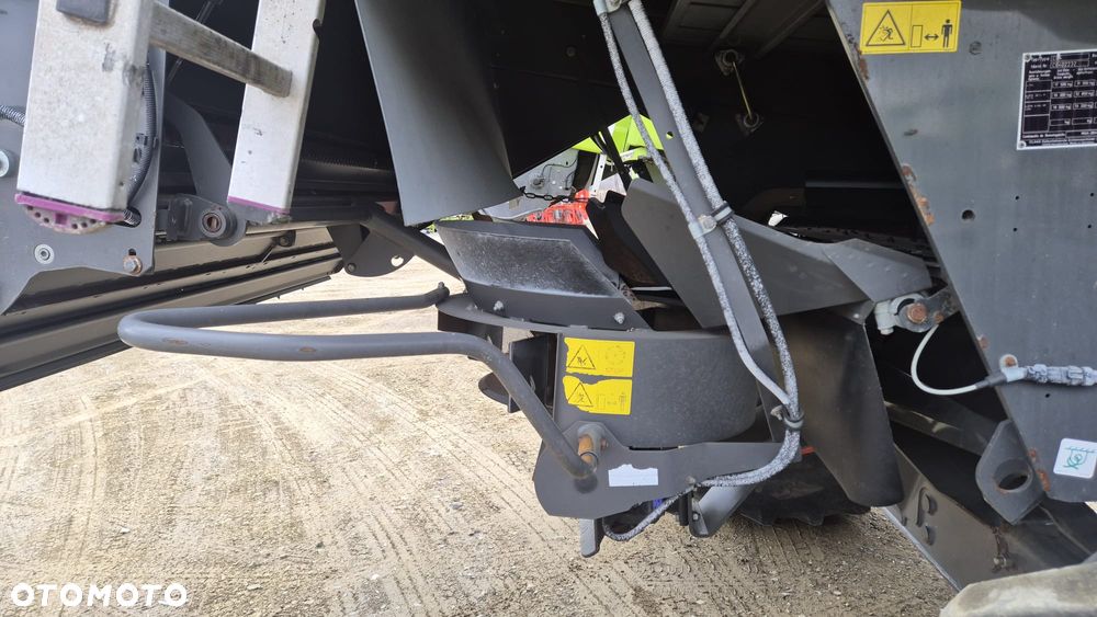Claas Lexion 660 z hederem - 13