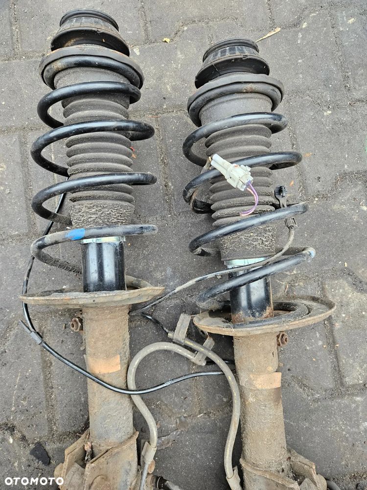 Toyota Yaris II 2 P9 mcpherson amortyzator przód przedni prawy lewy