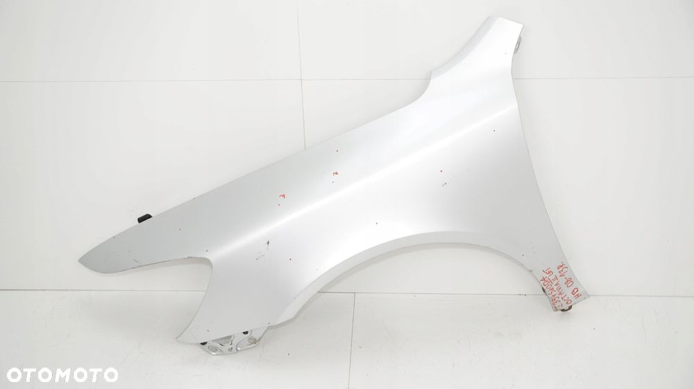 BŁOTNIK LEWY PRZÓD SKODA OCTAVIA II LIFT 08-13R LA7W - 1