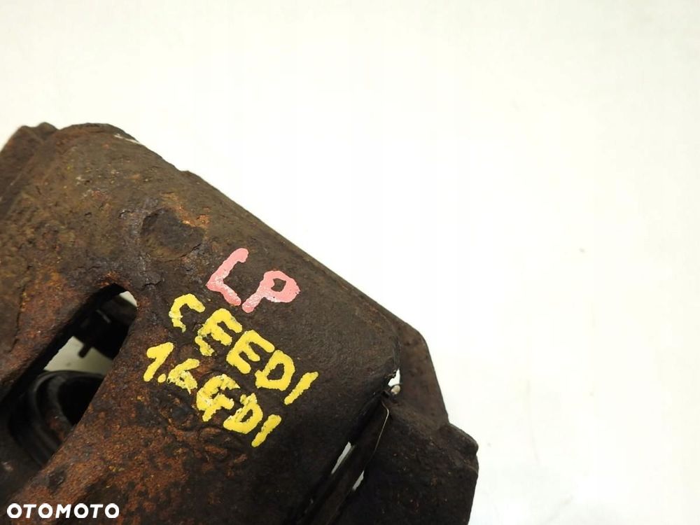 ZACISK HAMULCOWY LEWY PRZÓD KIA CEED I 1.6 GDI - 2