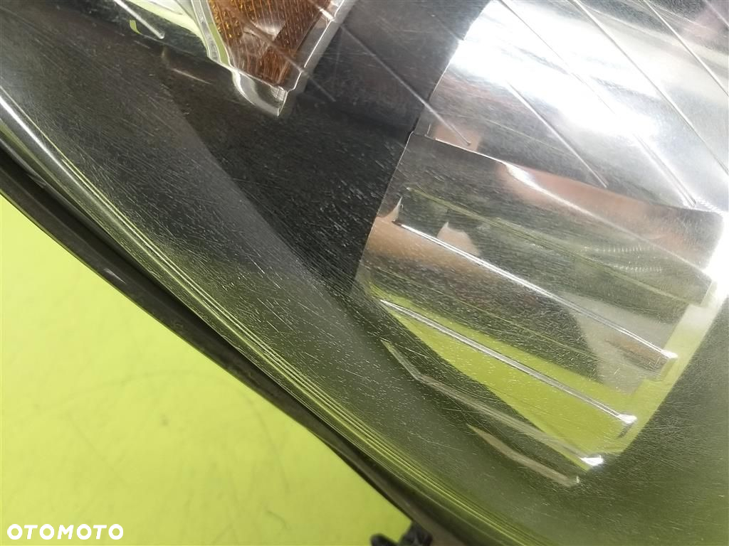 Reflektor lampa przód prawa Opel Astra III H 2004-2013 HELLA  1EG27037002 - 8