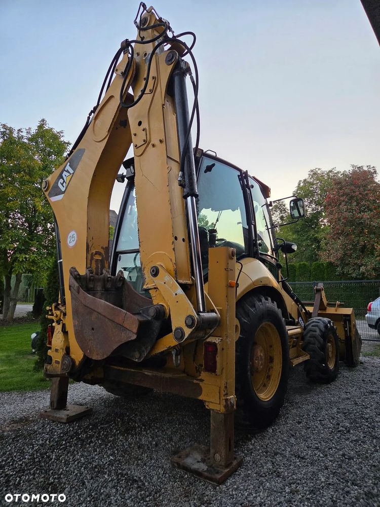 Caterpillar CAT 428E - 6