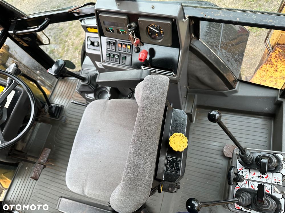Caterpillar CAT 428D 2002 rok 4x4 moc 80KM - 12