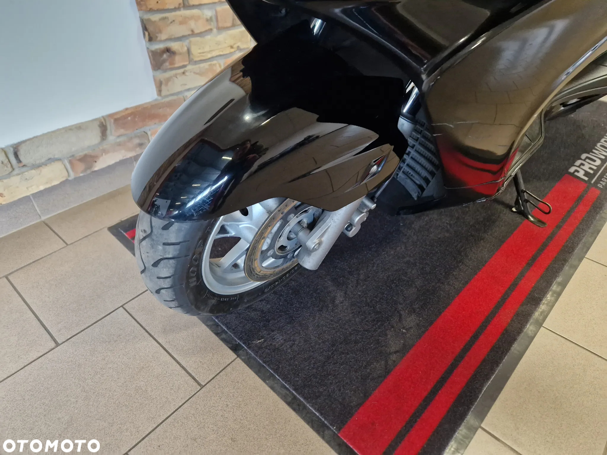 Suzuki Burgman - 10