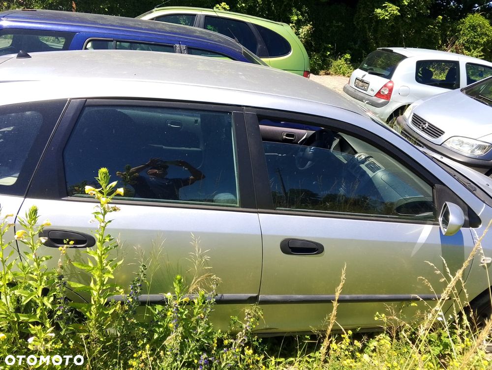 Honda Civic VII (00-04r.) 1.4 B 89KM. Silnik EU7 (D14Z6) (3113007)  Skrzynia SLW lakier NH623M. Cały na części. GWARANCJA !!!  Przód Tył Zestaw Komplet Drzwi Klapa Zderzak Błotnik Maska Grill Atrapa Szyba Pas Lampa Lusterko Boczki Fotel Kanapa Kokpit Deska Rozdzielcza Przełącznik Włącznik Sterownik Przewody Wiązka Instalacja Moduł Komputer Czujnik Listwa Pompa Alternator Wtryski Głowica Rozrusznik Kompresor Sprzęgło Dwumas Silnik Skrzynia ABS Klimatyzacji Paliwa Wspomagania Kolektor Turbina Przepustnica Zawór Chłodnica Koło Hak Belka Sanki Zawieszenie Mcpherson Półoś Amortyzator Wydech Tłumik Zacisk Most - 5