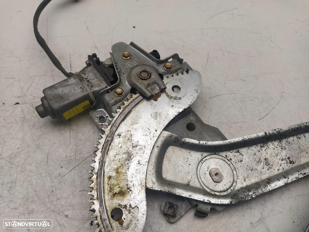 ELEVADOR DE VIDRO FRONTAL ESQUERDO KIA CARNIVAL II 2004 - 2