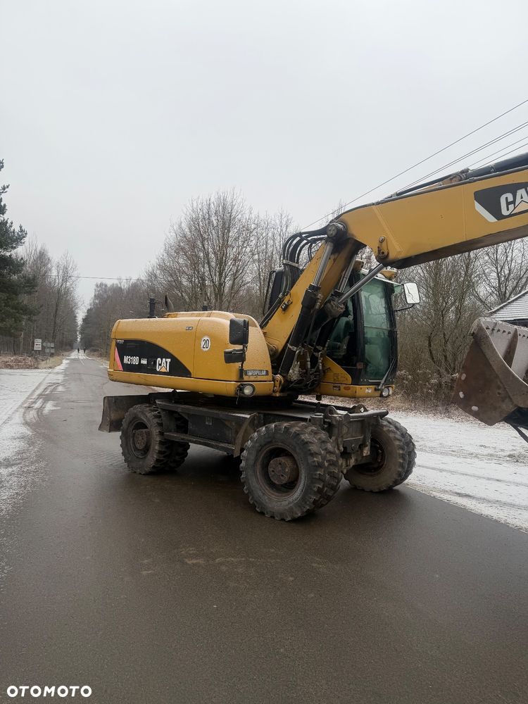 Caterpillar M318d - 6