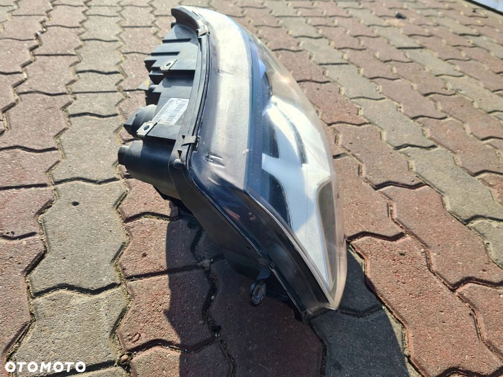 VW T5 LIFT lampa lewy przód BIXENON 7E5941015B - 2