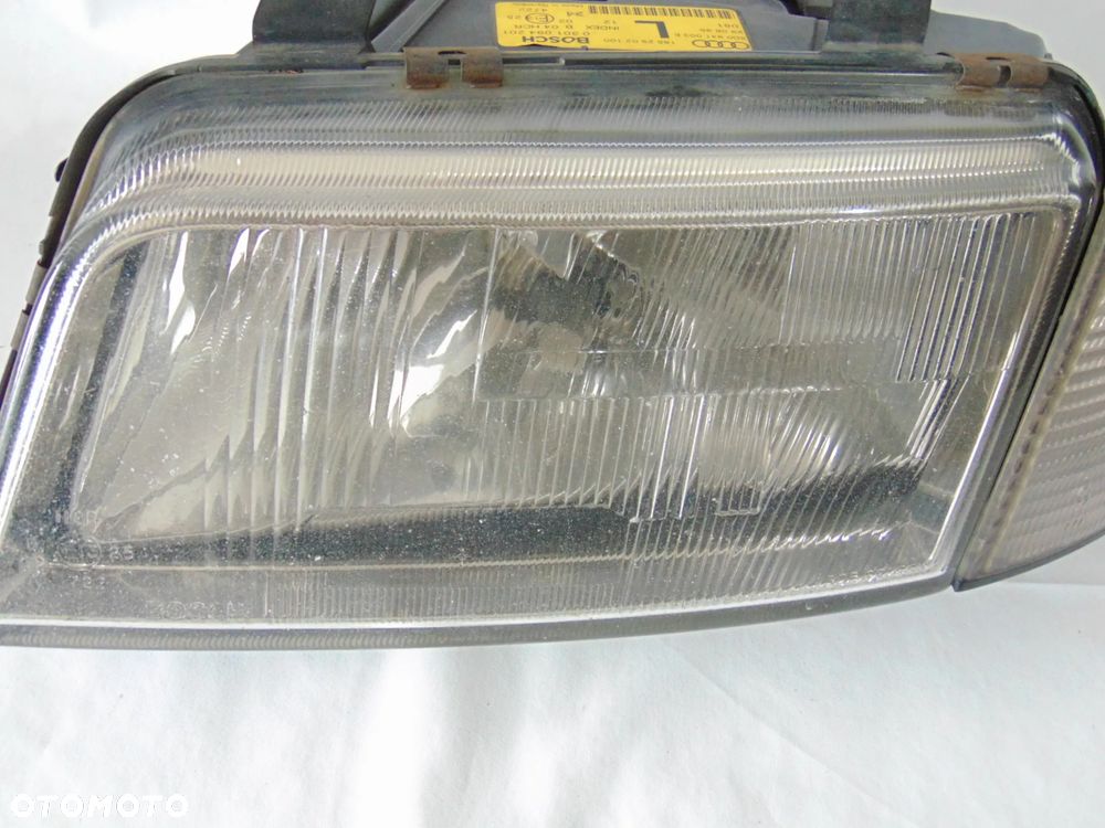ORYGINAŁ lampa przednia przód lewa Audi A4 B5 , 97-99r EUROPA - 2