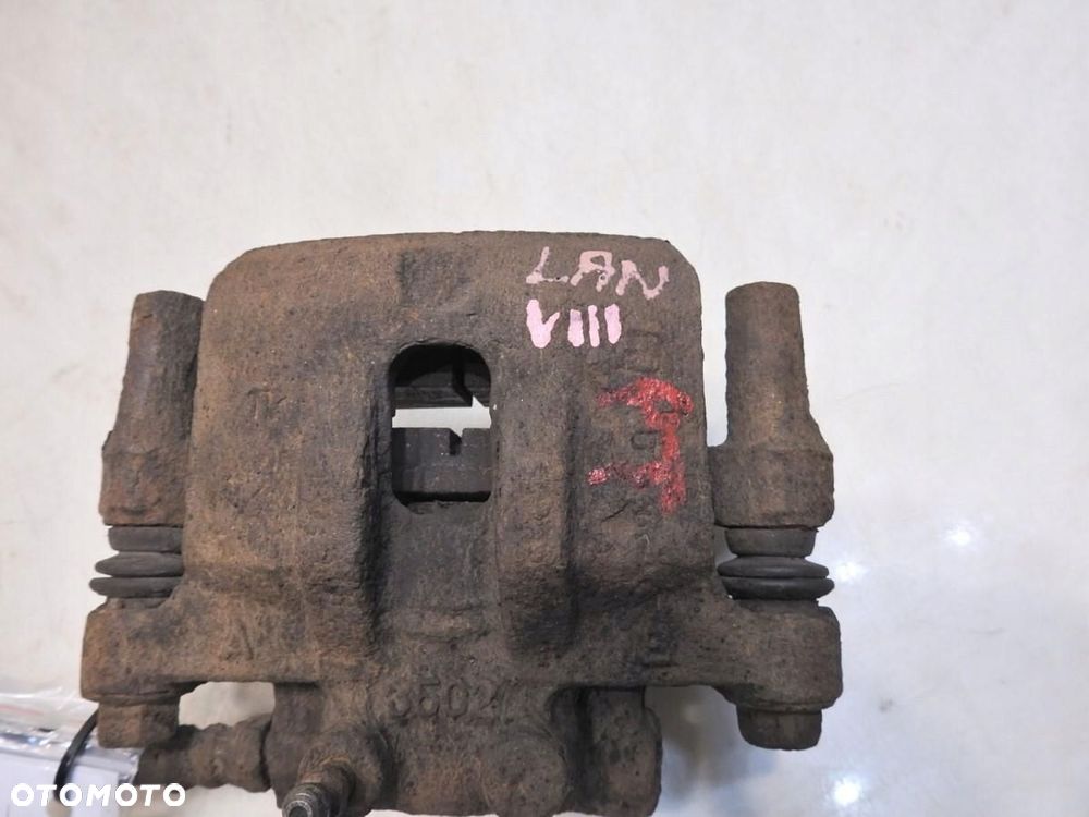 ZACISK HAMULCOWY PRAWY TYŁ MITSUBISHI LANCER VIII 1.8 - 2