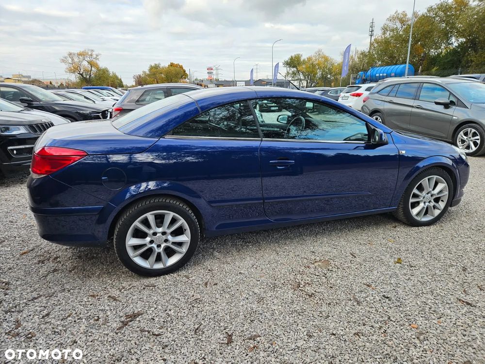 Opel Astra 1.8 Cosmo - 11