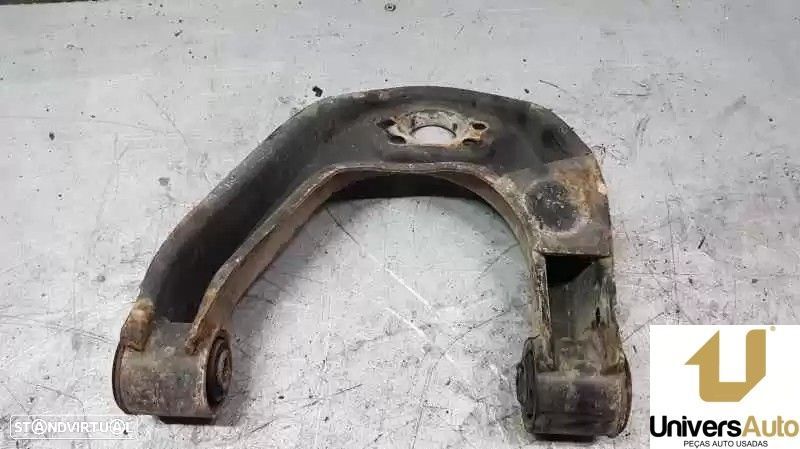 BRAÇO SUSPENSÃO SUPERIOR FRONTAL ESQUERDO NISSAN CABSTAR 2006 -545249X502 - 1