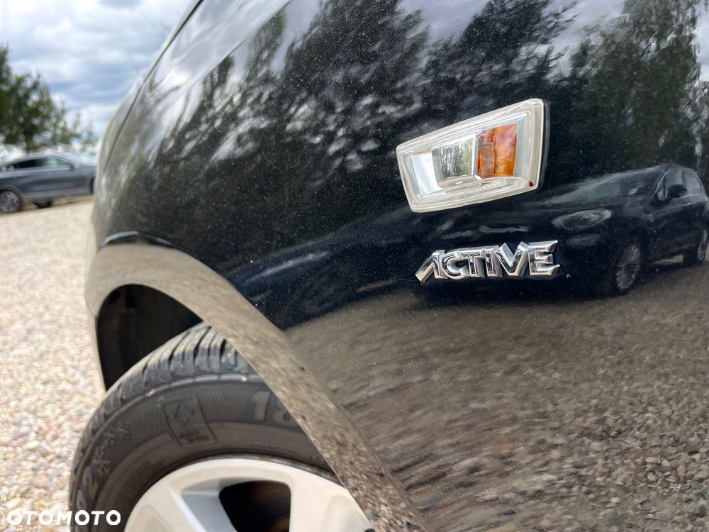 Opel Corsa 1.4 16V Active - 36