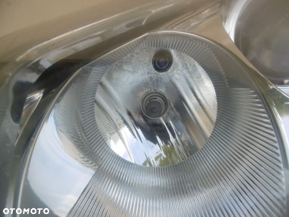 lampa lewa Passat B5 FL Hella Europa - 4