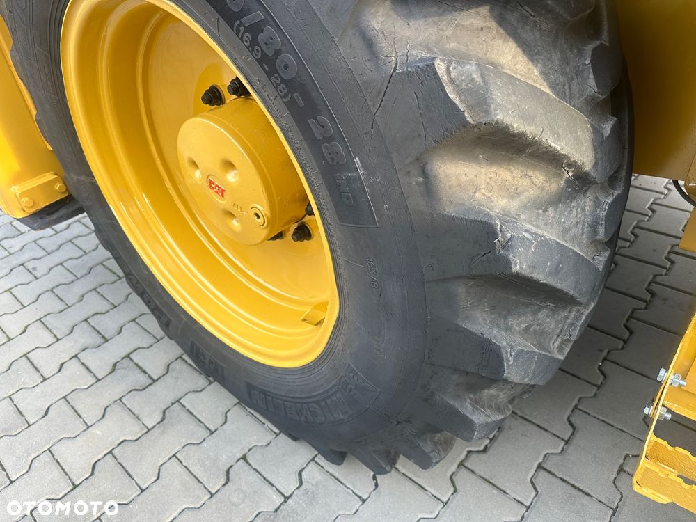 Caterpillar Cat 428 E - 7