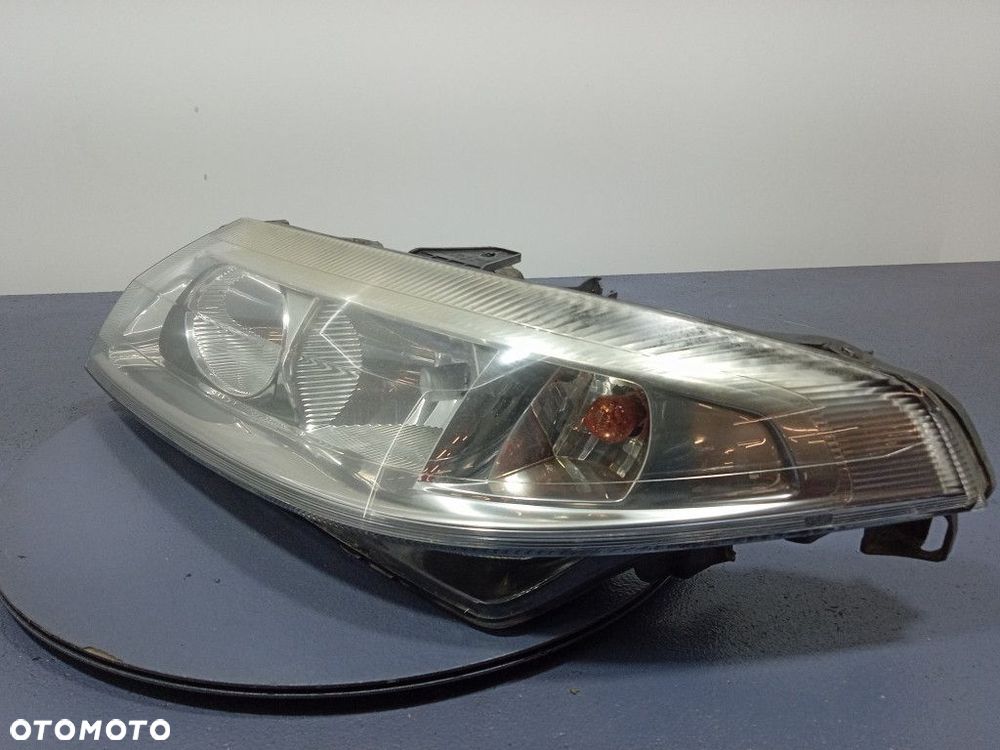 RENAULT LAGUNA II REFLEKTOR LEWY LAMPA H7 EU 7701048927 - 2