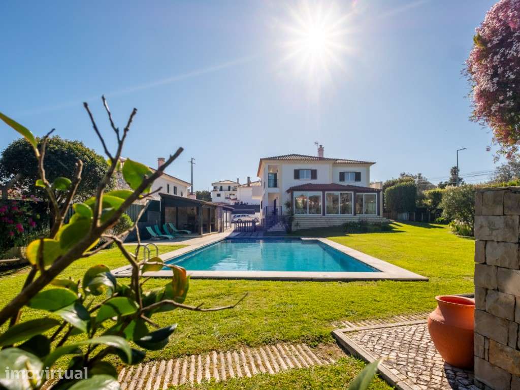 Moradia isolada inserida em terreno de 1370 m2 com piscina - Grande imagem: 2/43
