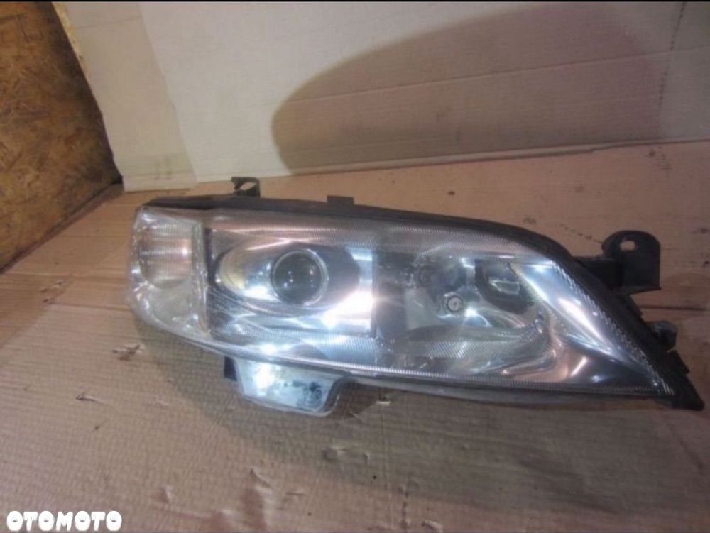 1307022294 lampa prawa przód xsenon ksenon opel vectra b