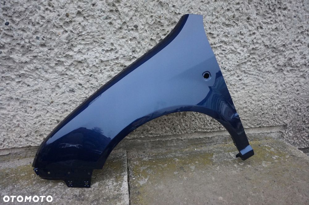 BŁOTNIK PRZEDNI LEWY SKODA FABIA I 1 9460