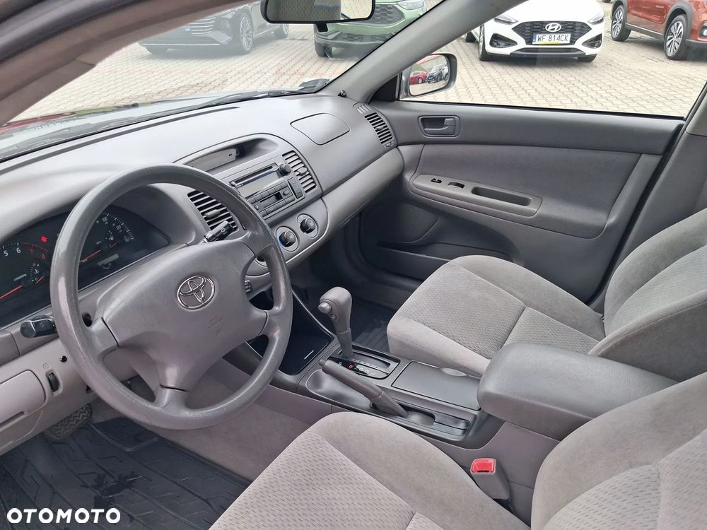 Toyota Camry 2.4 XLE - 24