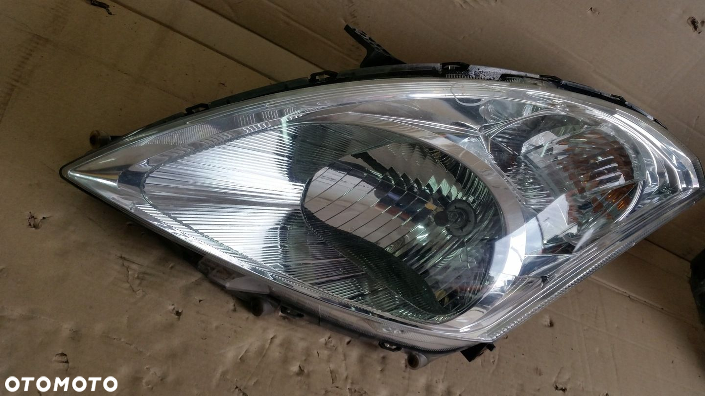 LAMPA LEWA REFLEKTOR SUZUKI SWIFT MK7 10- - 6