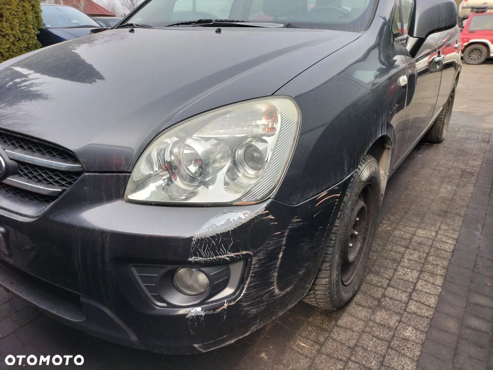 KOMPLET FOTELI  SKÓRZANYCH PRZÓD TYŁ 3 RZĄD KIA CARENS III 06-12r KOD LAK. 1U - 13