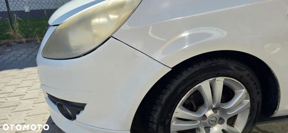 Opel Corsa 1.4 16V Cosmo - 7