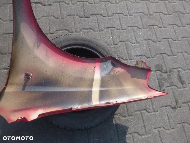 BŁOTNIK PRAWY PRZÓD PRAWY PRZEDNI CHEVROLET AVEO I T200 03-08 - 11