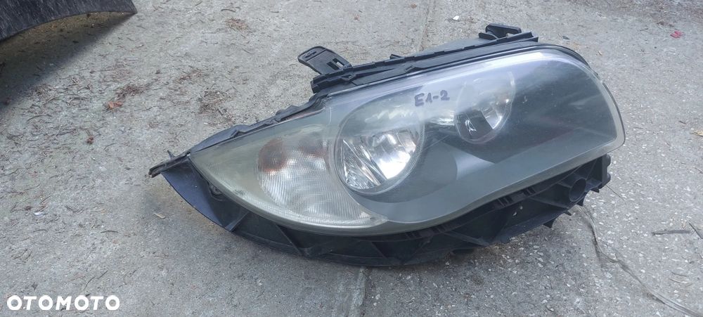 .  PRZOD PRZENIA LAMPA PRAWA BMW E87 - 1