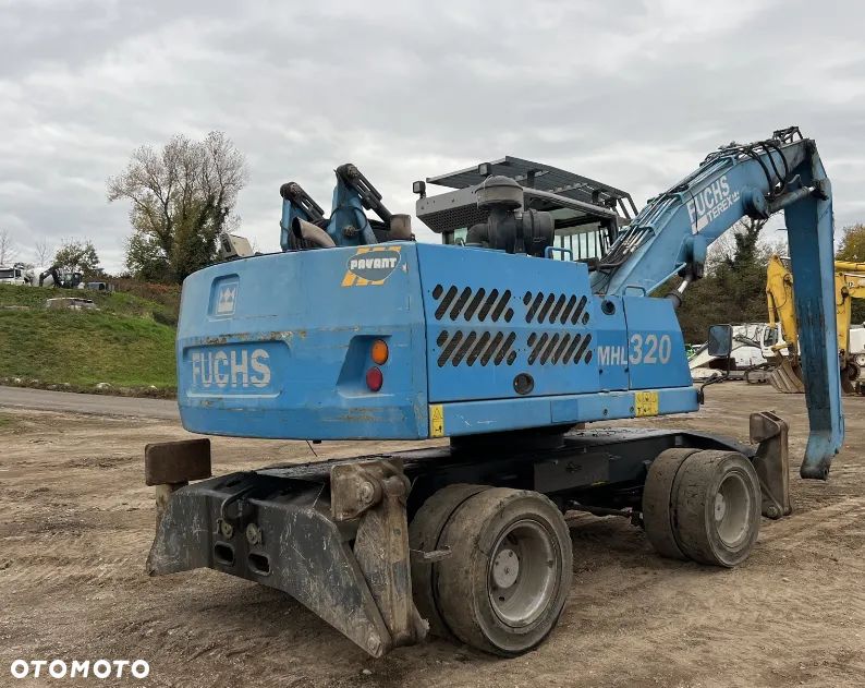 Fuchs MHL 320 Terex - 3
