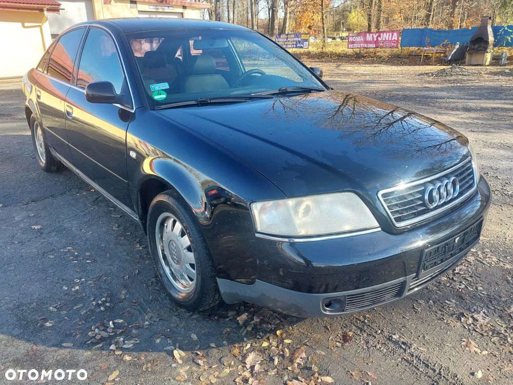 Audi A6 C5 sedan silnik kompletny 1.8 Turbo AEB turbina turbosprężarka cewka wiązka przepustnica przepływomierz kolektor skrzynia biegów DHW sprzęgło dwumasa drzwi lewe prawe klapa błotnik lusterko kolor LY9B czarny maglownica wydech tłumik lampa tył tylna blenda belka rura dolotowa przewód podłokietnik sterownik panel boczki fotele grzane alufelgi szyba dekory NA CZĘŚCI WSZYSTKIE CZĘŚCI - 1
