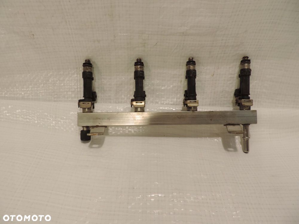 OPEL CORSA D 1.4 A14XER LISTWA WTRYSKOWA 55562258 - 2