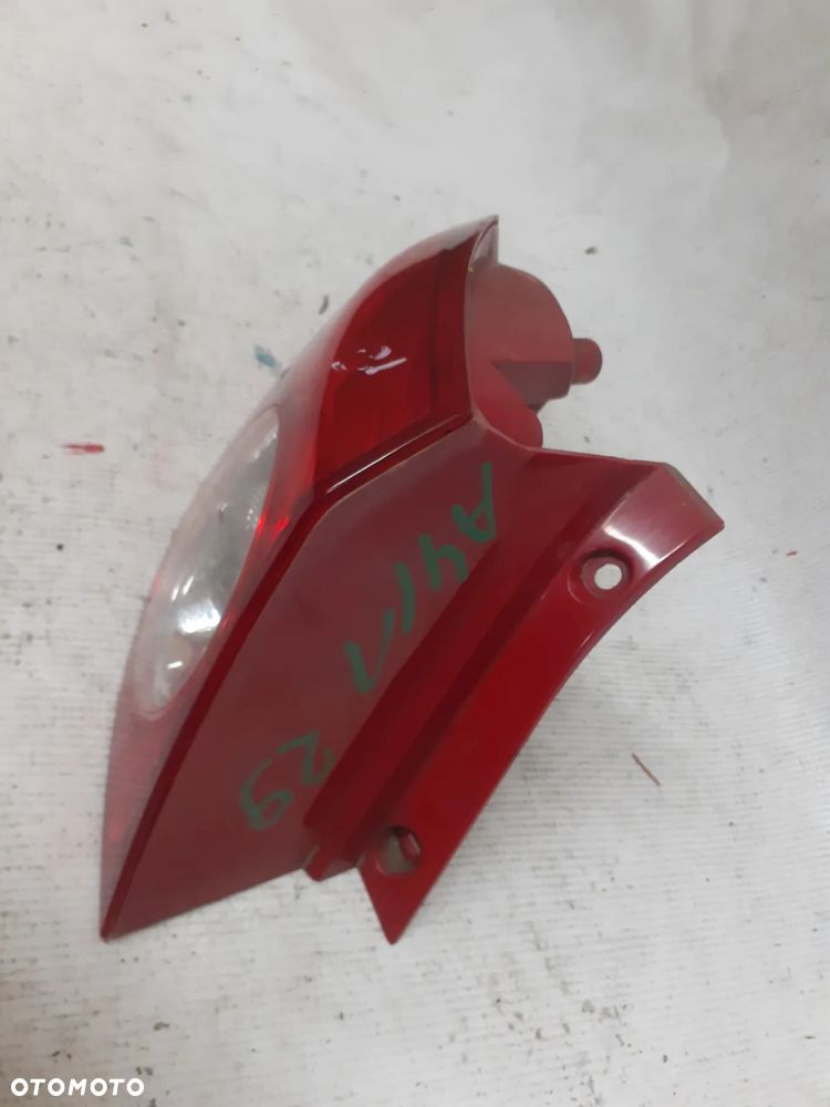 .  TYL TYLNA LAMPA LEWA CHEVROLET LACETTI - 2