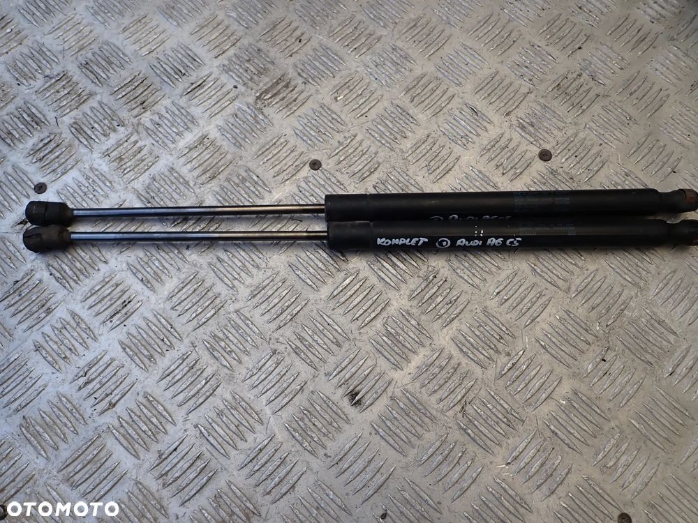 AUDI A6 C5 CZĘŚCI (1)- 4A0857833D, 8E0/1J0864203 B/C/D, 4B9827507M, 4B0823509,4B9827085D, 4B1880204G, DZWIGNIA HAMULCA RĘCZNEGO, 4B9827552M, 4B0823359C, LINKA MASKI, 8L0035501E, 4B0959655P, 8E0909559H, (E8) 67R-016205, 4B0962258N, 8D0422373C, 4B0955453A,  RADIO +PANEL - 15