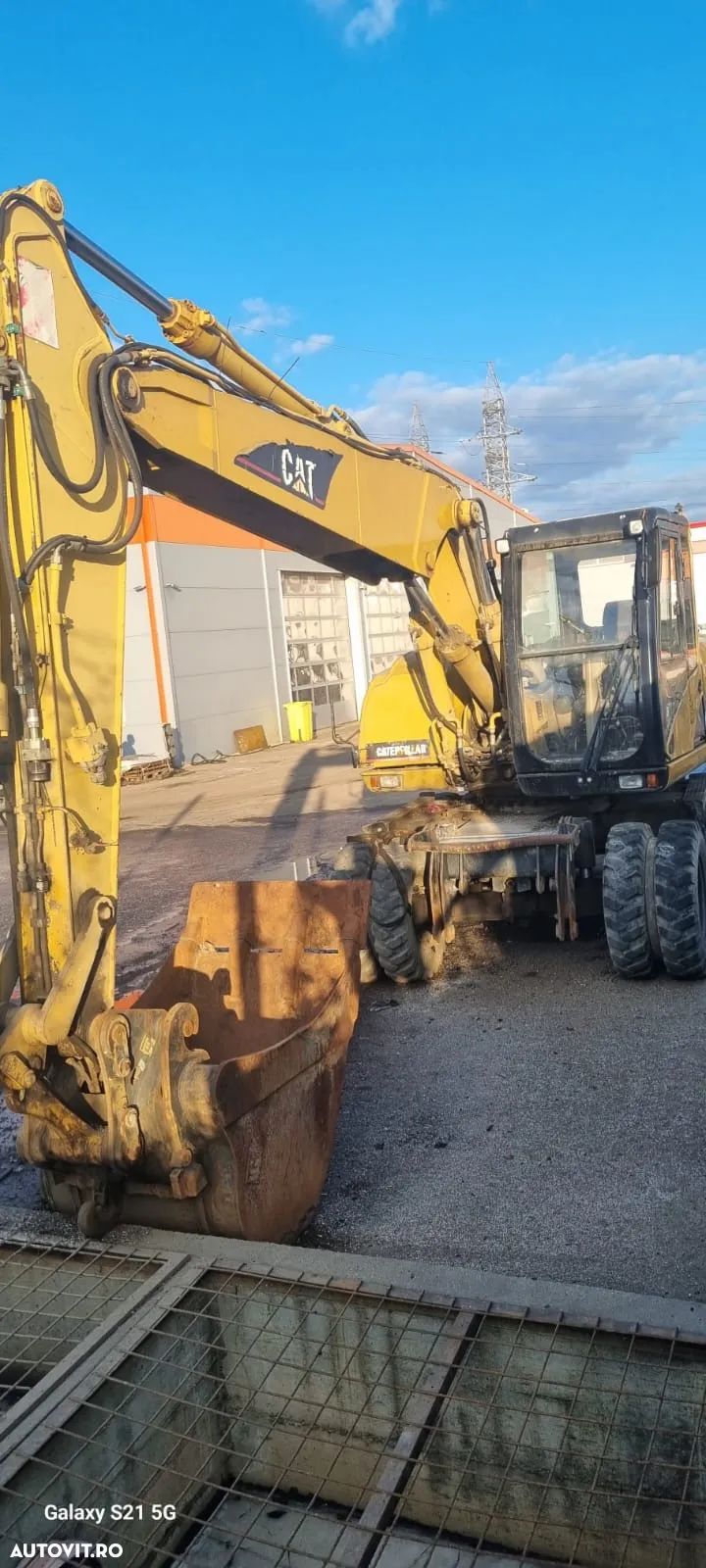 Caterpillar CAT M 315 C Excavator pe roti - 1