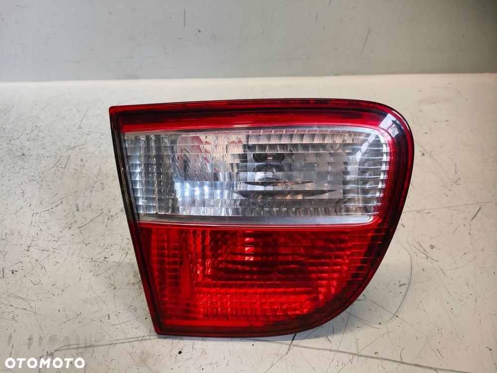 LEON I 98- LAMPA LEWY TYŁ W KLAPE - 1