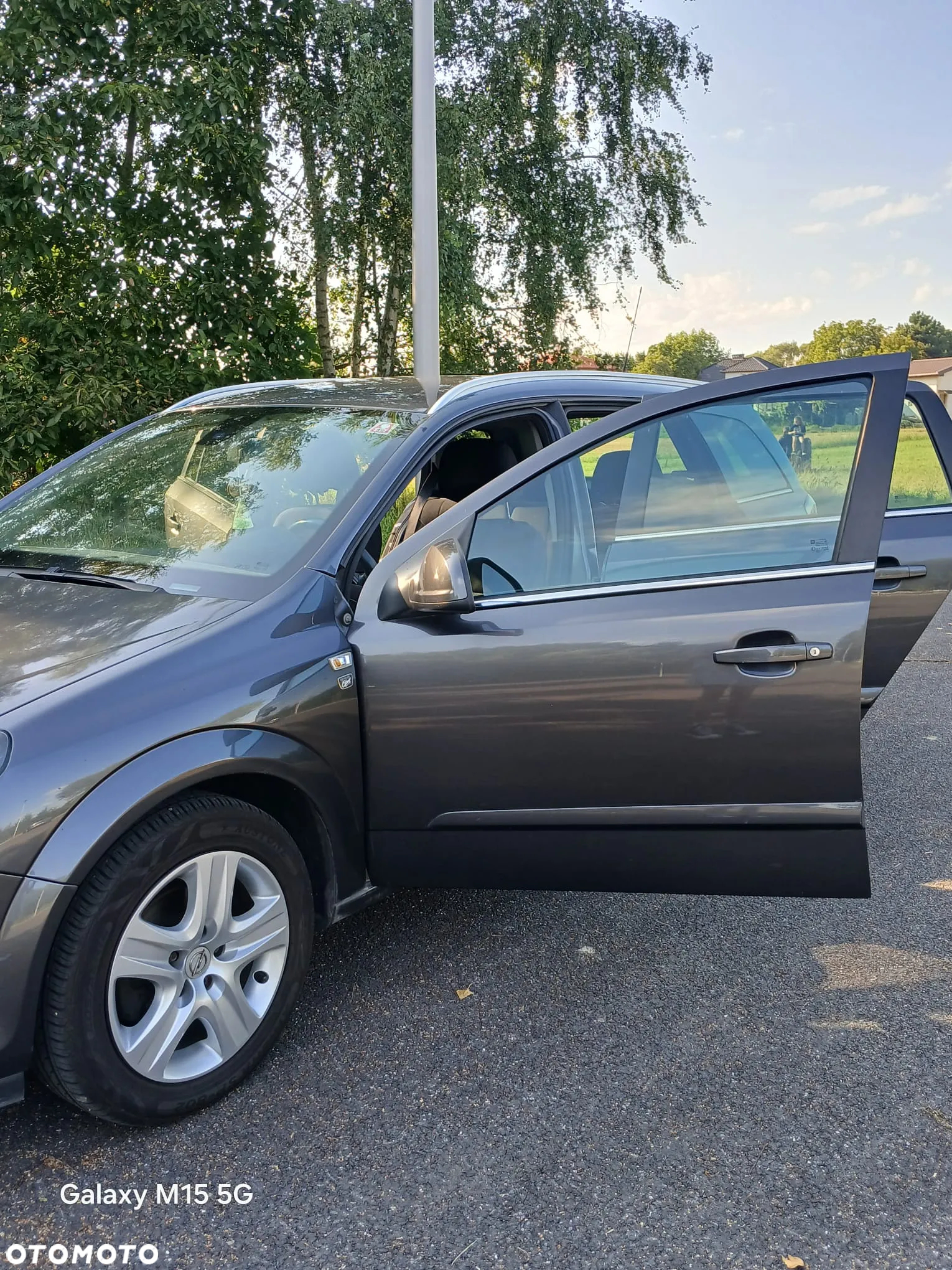 Opel Astra 1.6 Caravan Cosmo - 12