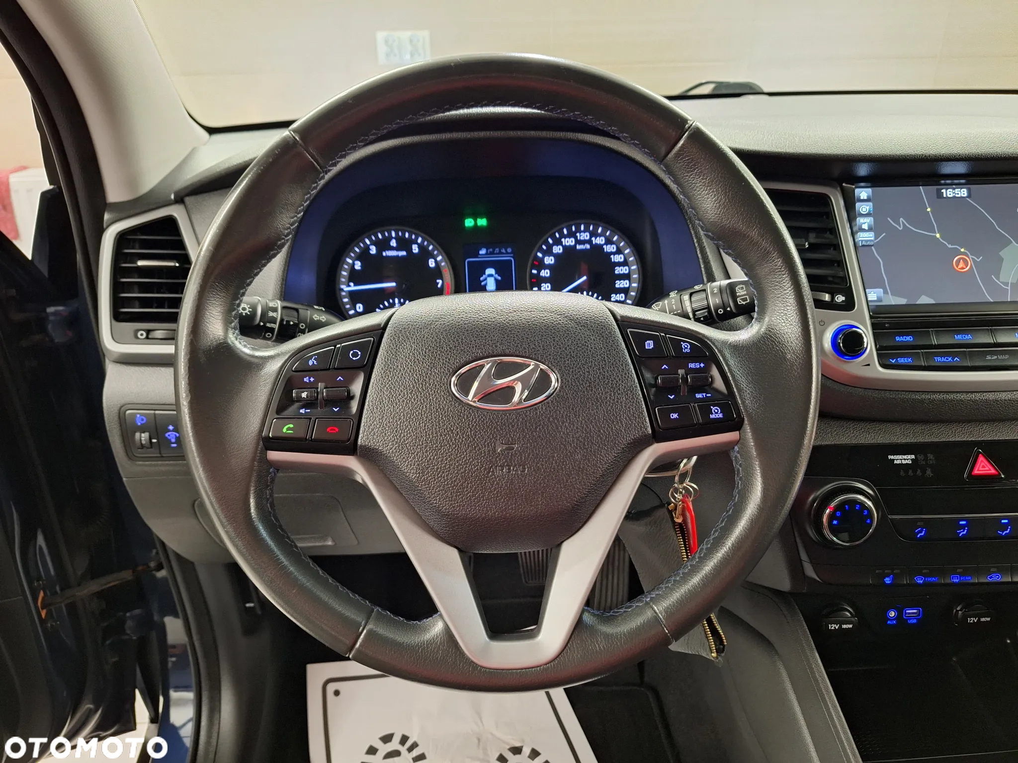 Hyundai Tucson blue 1.6 GDi 2WD Navi - 30