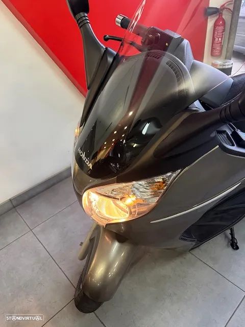 Honda SW-T S WING - 125  4 TEMPOS - 9