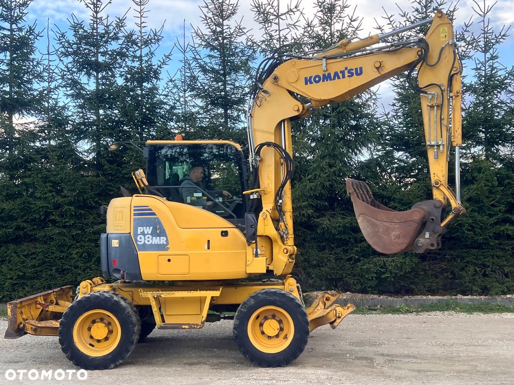 Komatsu Koparka kołowa KOMATSU 10ton PW98MR-8 4x4x4 plug podpory KLIMA 30km/h ramie Long 3xłamane skrętne 2012r bez DPF i ADBLUE 4cyl dodatk wyjścia hydr 51Kw 2osie skrętne pług stopy Cat TEREX Liebherr Wacker Pw 98 mr 8 11 prosto z importu - 10