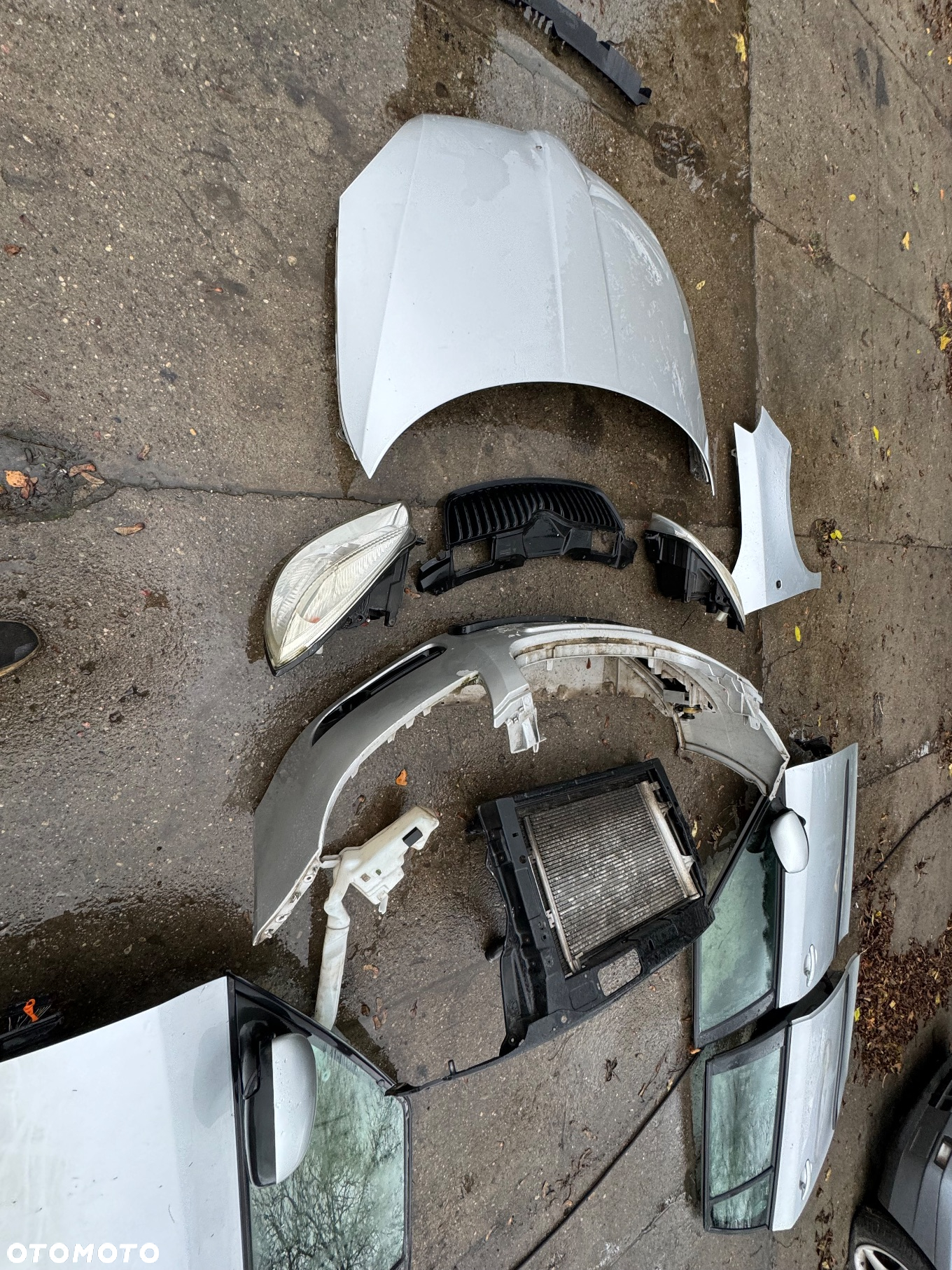 Skoda Fabia 2 benzyna srebrna maska pas przedni chłodnica wody klimy lampa przód przednią prawa lewa błotnik prawy zderzak przód przedni drzwi szyba prawe lewe tylne przednie klapa tył tylnią lampy tył tylnie - 6