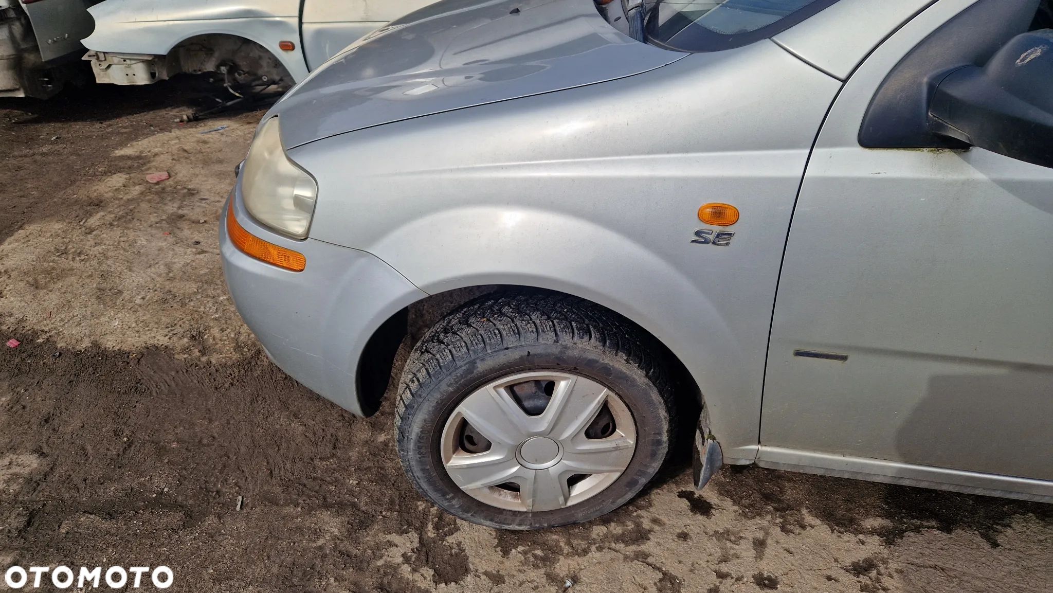 CHEVROLET AVEO BŁOTNIK LEWY PRZÓD 95U - 1